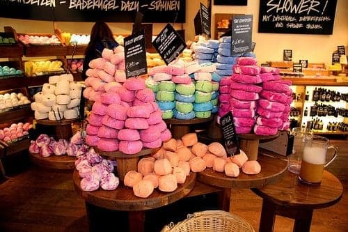 Display of colorful bath bombs and bath products in retail store