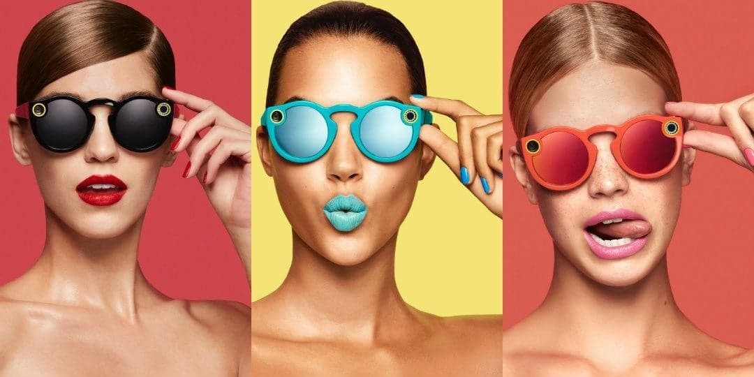 Three women wearing Snapchat Spectacles camera sunglasses
