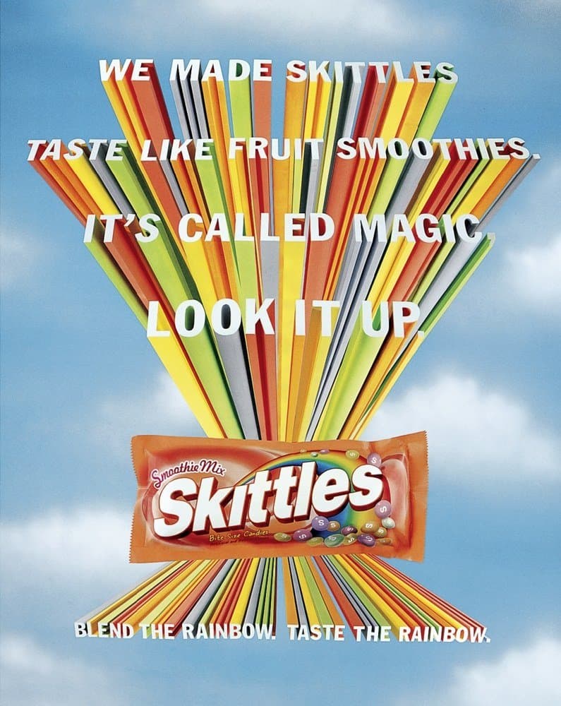 Skittles ad with colorful stacked markers and campaign tagline
