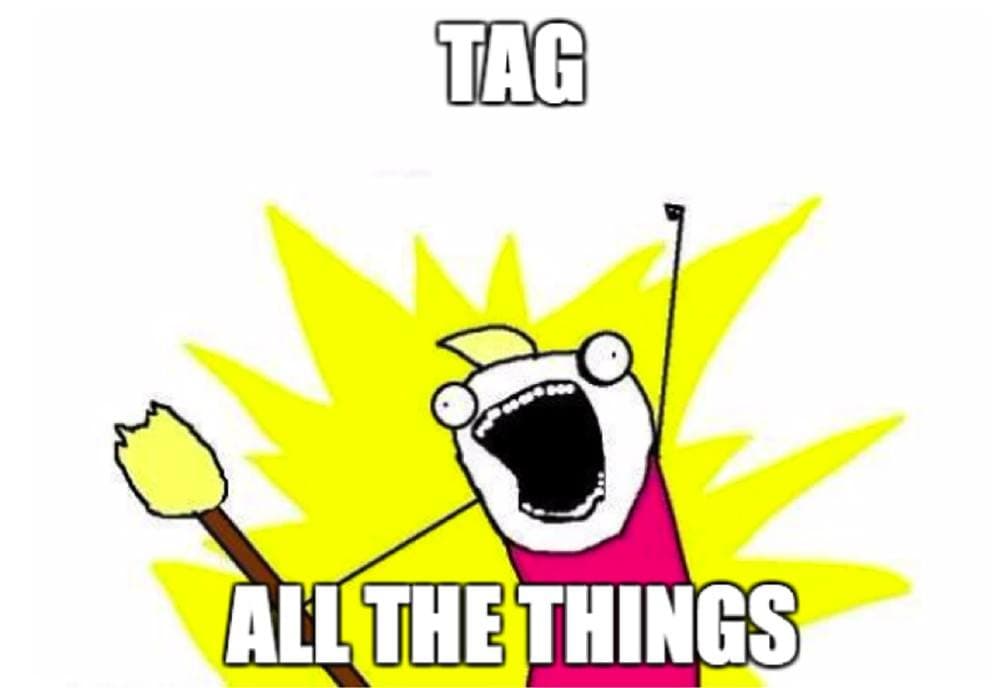 Meme with 'Tag all the things' caption featuring character with raised arms