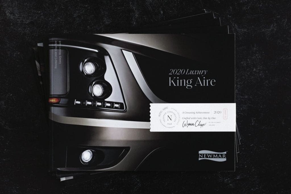 Newmar luxury diesel RV brochure cover showcasing vehicle exterior