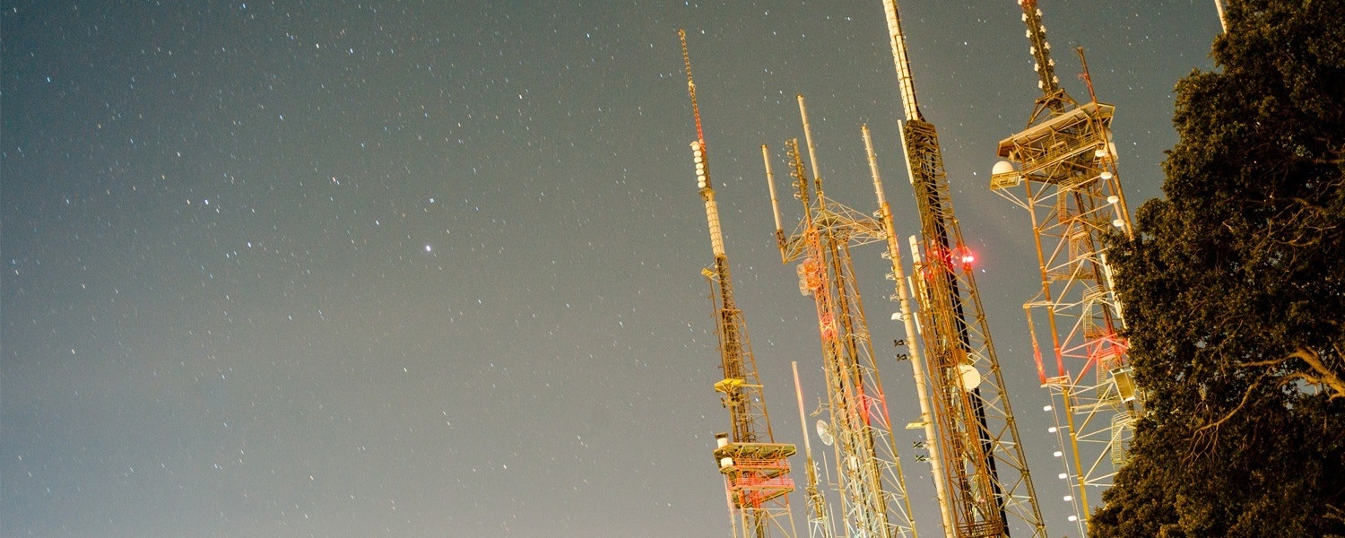 several towers against an evening sky