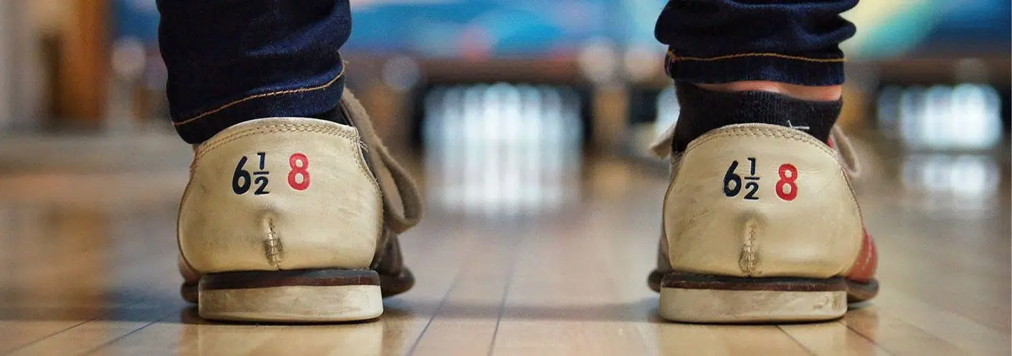 close up on a man's bowling shoes