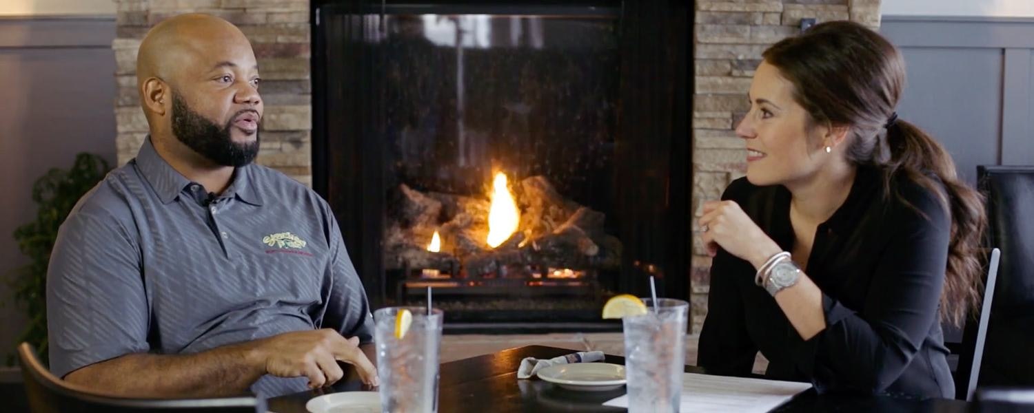 Gary Brackett sitting for an interview with Tiffany Sauder