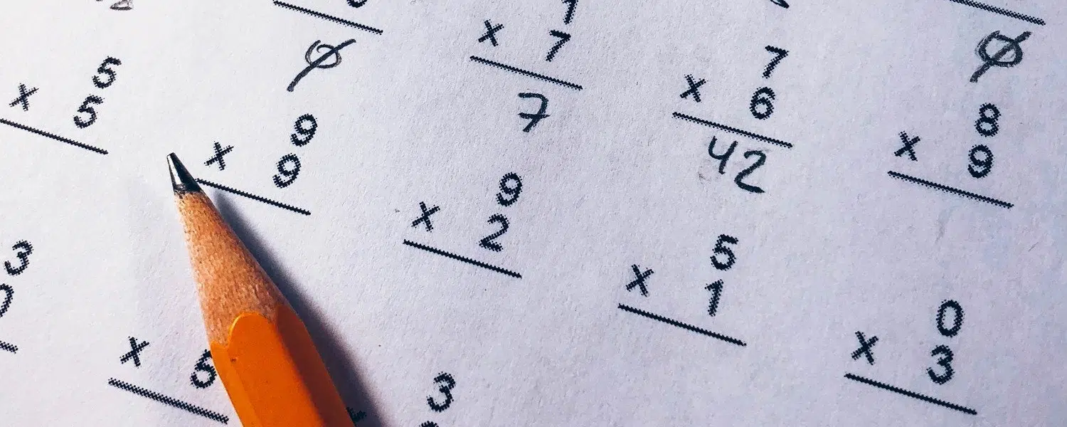 piece of paper with multiplication tables on it