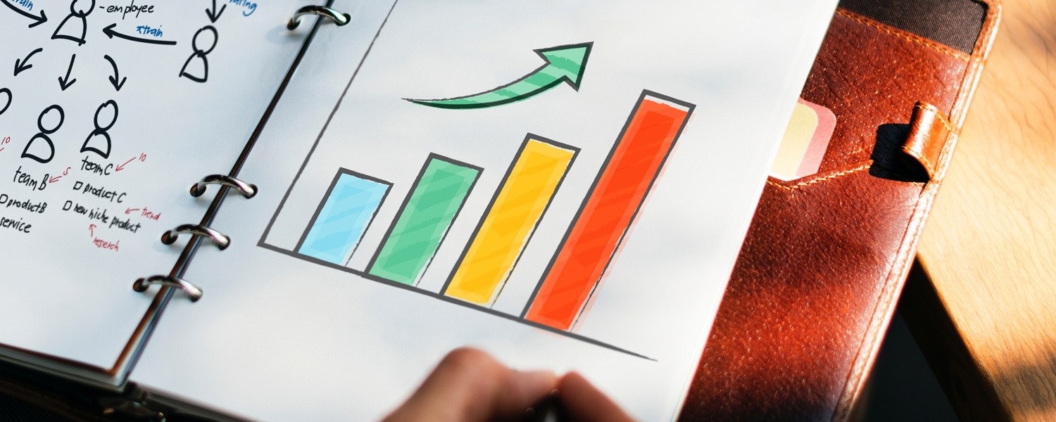 hand-drawn bar chart with trend arrow