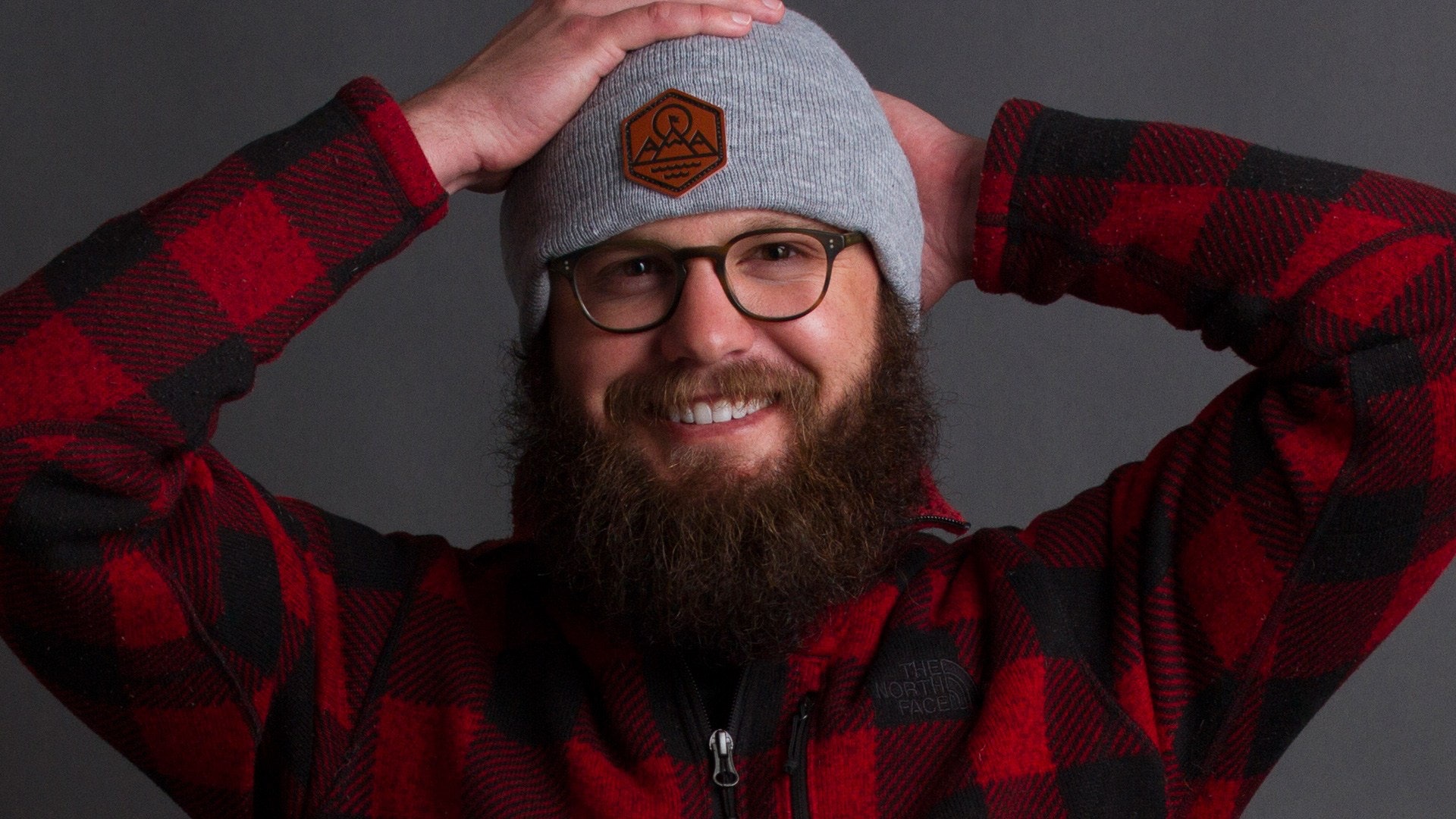 bearded man with element three beanie