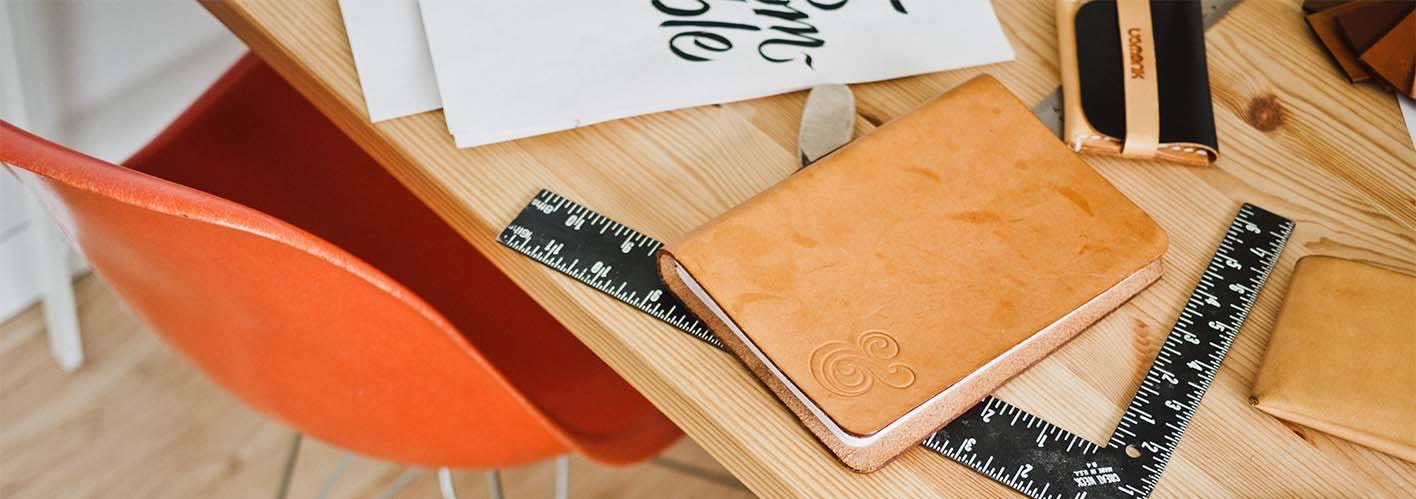 design tools on a table with a red chair