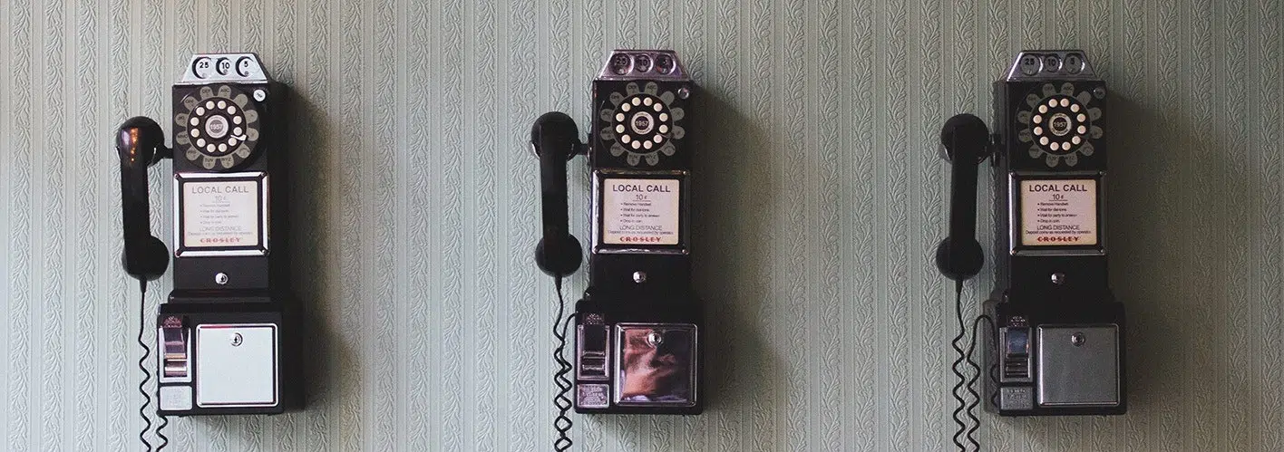 antique telephone on a wall