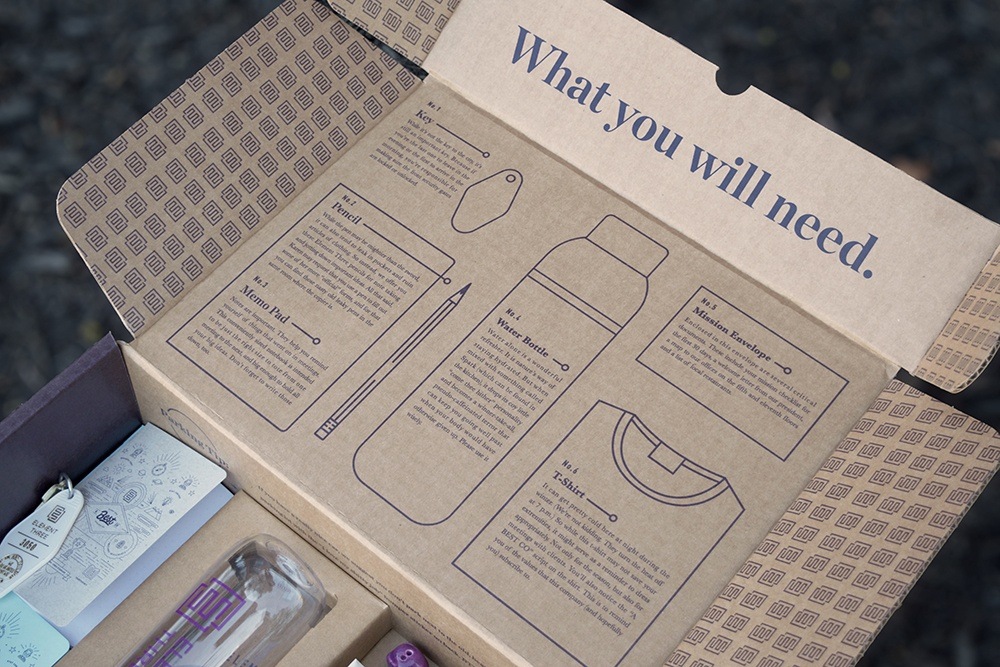 E3 Onboarding Cardboard Box with Purple Text