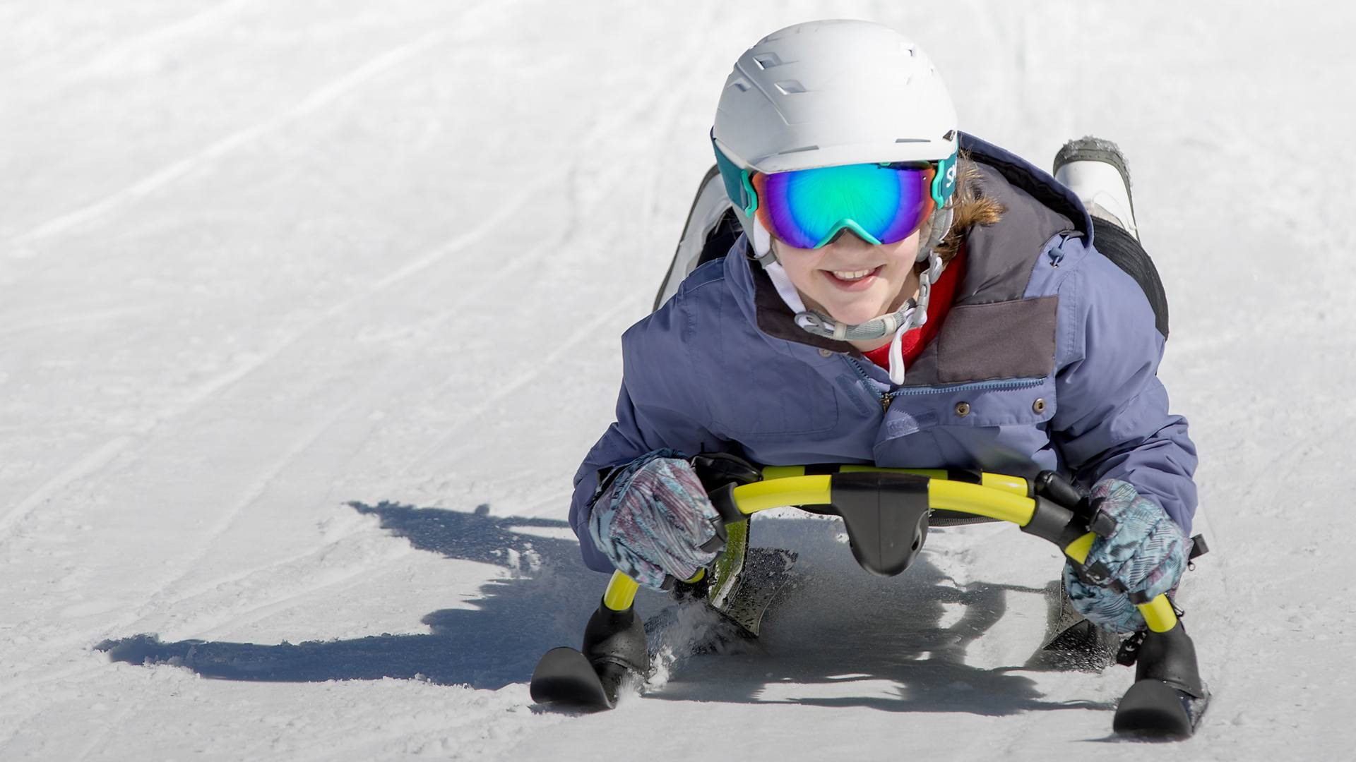 Boy on Airhead Sled