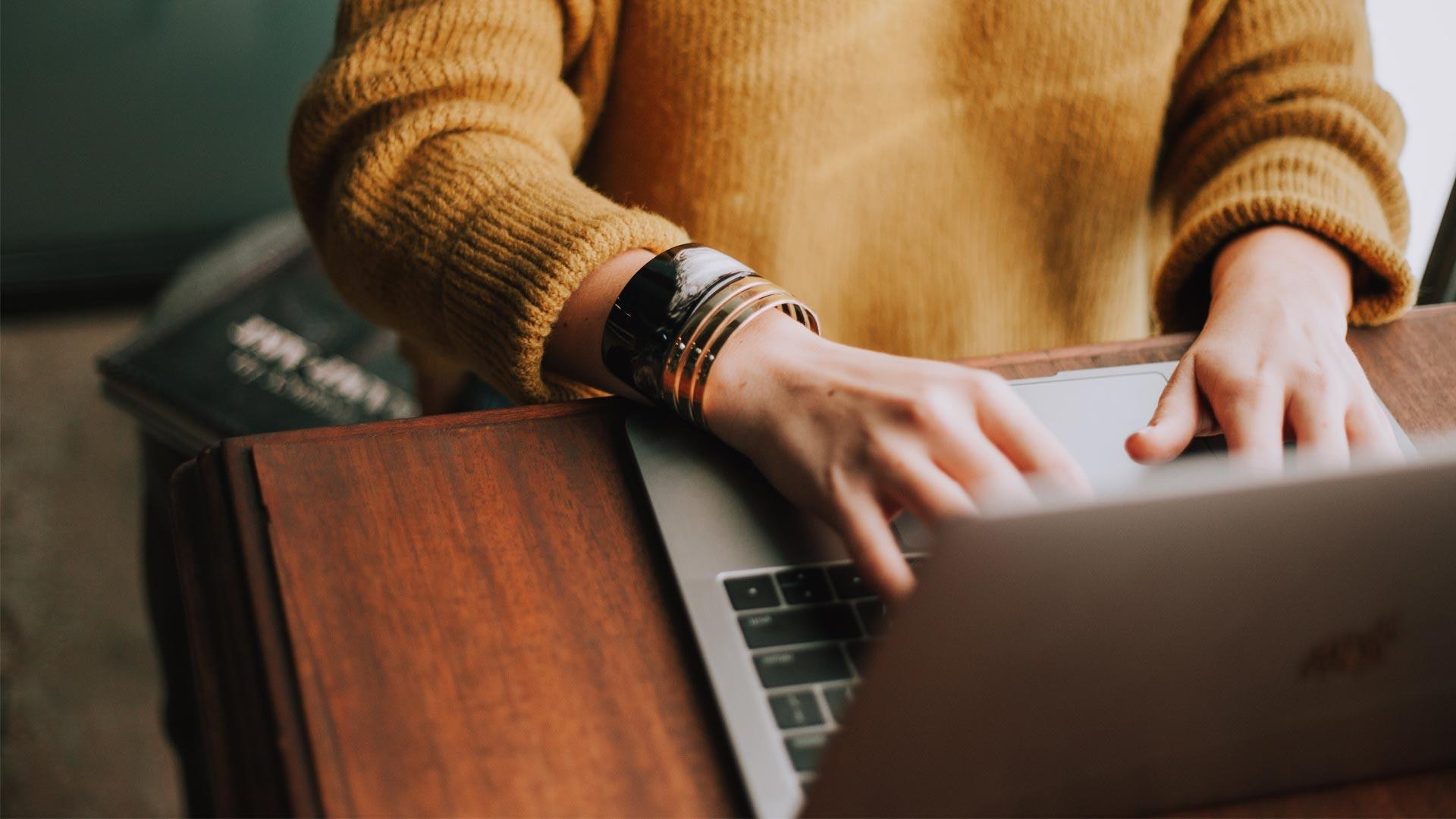 SEO Strategist Working on a Laptop