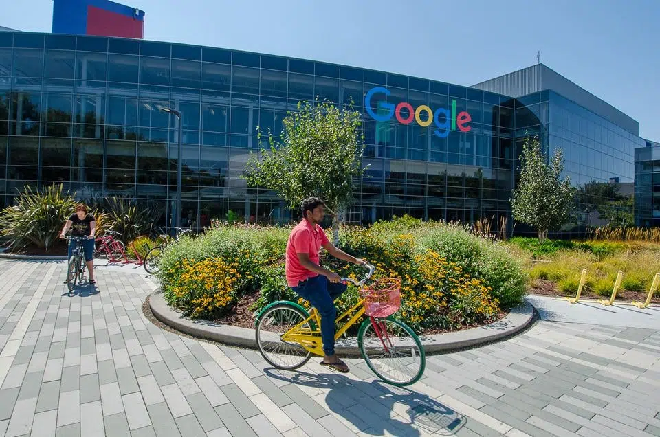 Google Headquarters with Biker in Front of Building